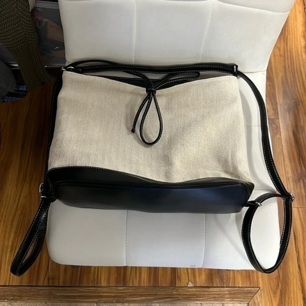 Beige and black bag/convertible bookbag, perfect for every day on the go